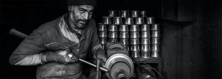 Metal worker working hard